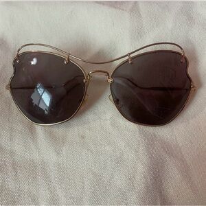 Miu Miu Gold Frame Sunglasses with Dark Lenses